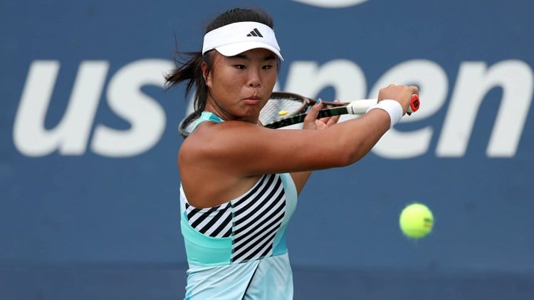 Mingge Xu hits a backhand at the US Open