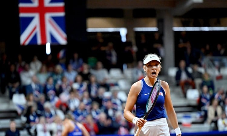 Katie Boulter celebrates a point at the Billie Jean King cup in front of the British fans