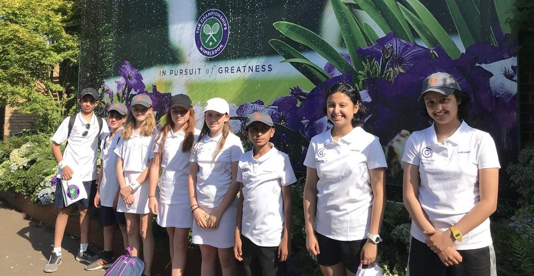 students posing infront of wimbledon