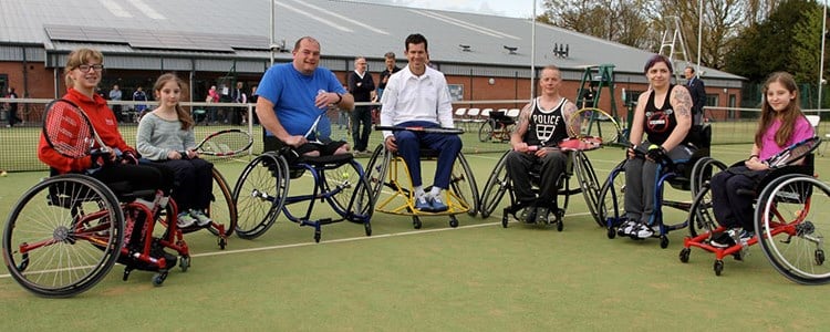 Group of wheelchair tennis players on a tennis court