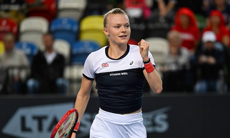 British tennis player Harriet Dart clenching her fist on court at the Billie Jean King Cup Play-off tie against Sweden