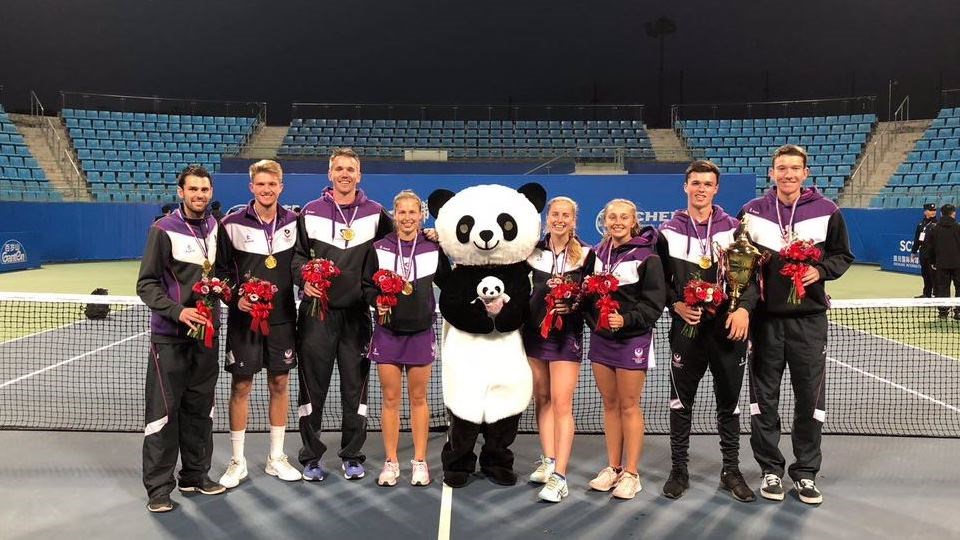 Loughborough university team with awards and panda mascot