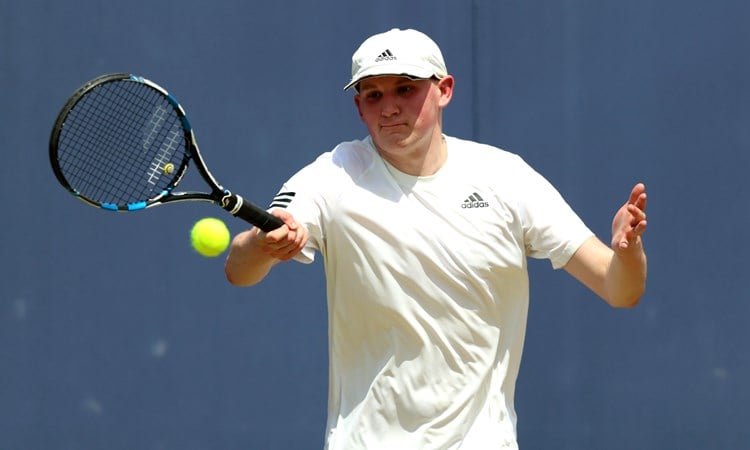 Oliver beadle of Great Britain plays a forehand against Dominic Iannotti of Great Britain during the Men's Learning Disability Exhibition match on Day Five of the cinch Championships at The Queen's Club on June 21, 2024 in London, England. 