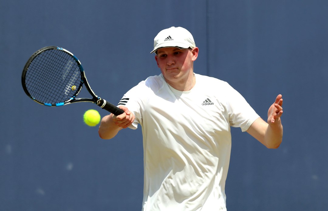 Oliver beadle of Great Britain plays a forehand against Dominic Iannotti of Great Britain during the Men's Learning Disability Exhibition match on Day Five of the cinch Championships at The Queen's Club on June 21, 2024 in London, England. 