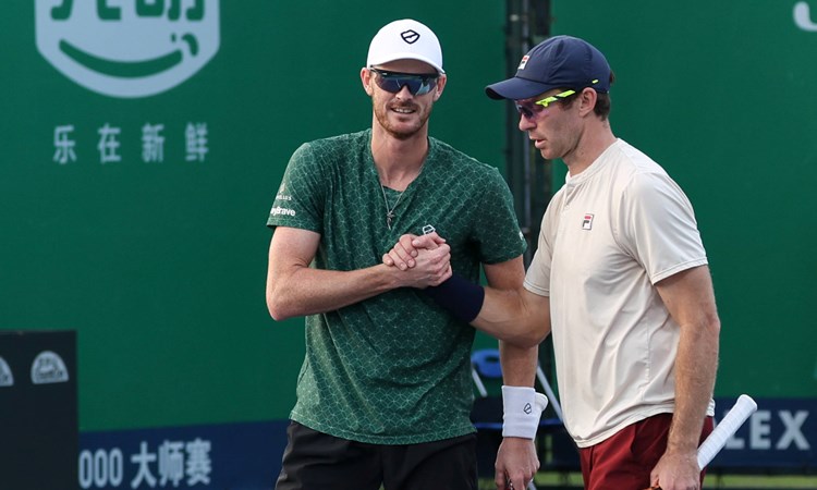 British tennis player Jamie Murray shaking hands with Australian doubles partner  John Peers at the Rolex Shanghai Masters