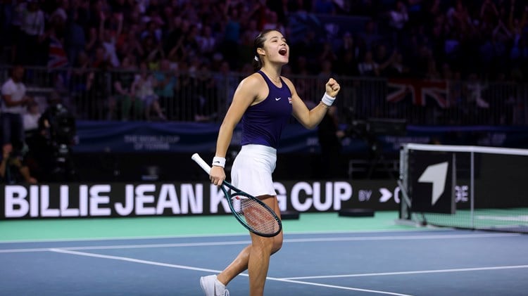 Emma Raducanu cheers after beating Jule Niemeier at the Billie Jean King Cup