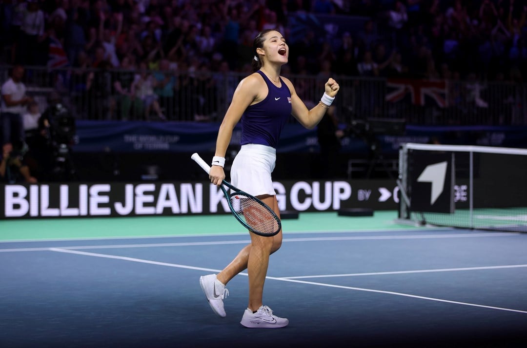 Emma Raducanu cheers after beating Jule Niemeier at the Billie Jean King Cup