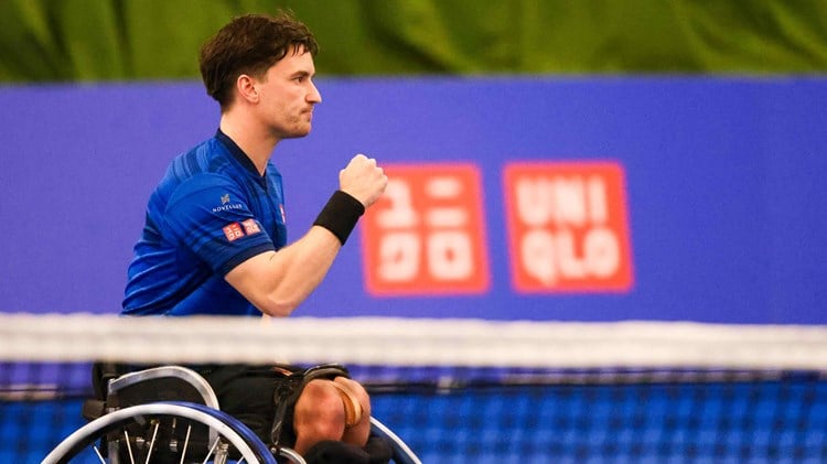 British wheelchair tennis player Gordon Reid clenching his fist on court at the Wheelchair masters after reaching the men's singles final