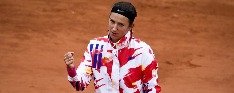 Victoria Azarenka celebrating in her colourful winter jacket