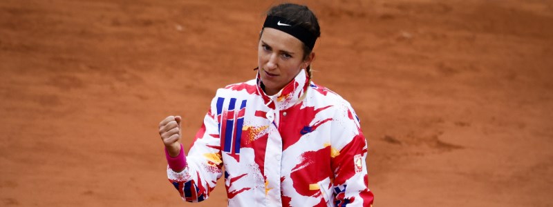 Victoria Azarenka celebrating in her colourful winter jacket