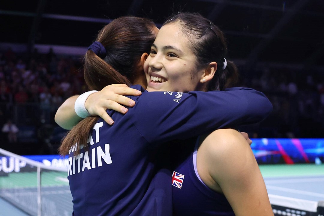 Emma Raducanu and Anne Keothavong hug after Great Britain beat Canada at the Billie Jean King Cup