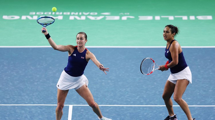 Olivia Nicholls lines up a volley in the deciding doubles rubber against Slovakia at the Billie Jean King Cup