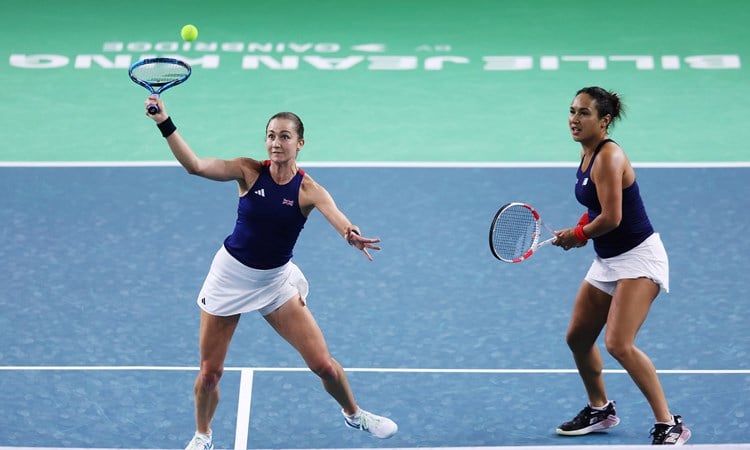 Olivia Nicholls lines up a volley in the deciding doubles rubber against Slovakia at the Billie Jean King Cup