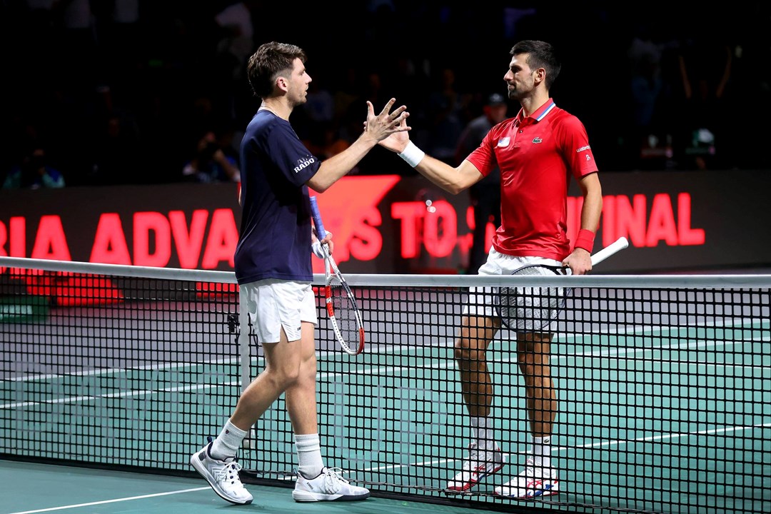 Cam Norrie and Novak Djokovic shake hands at the Davis Cup Finals