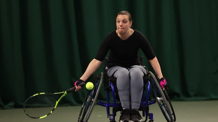 Wheelchair tennis player Naomie Traver reaching for a forehand t the Lexus Wheelchair National Finals