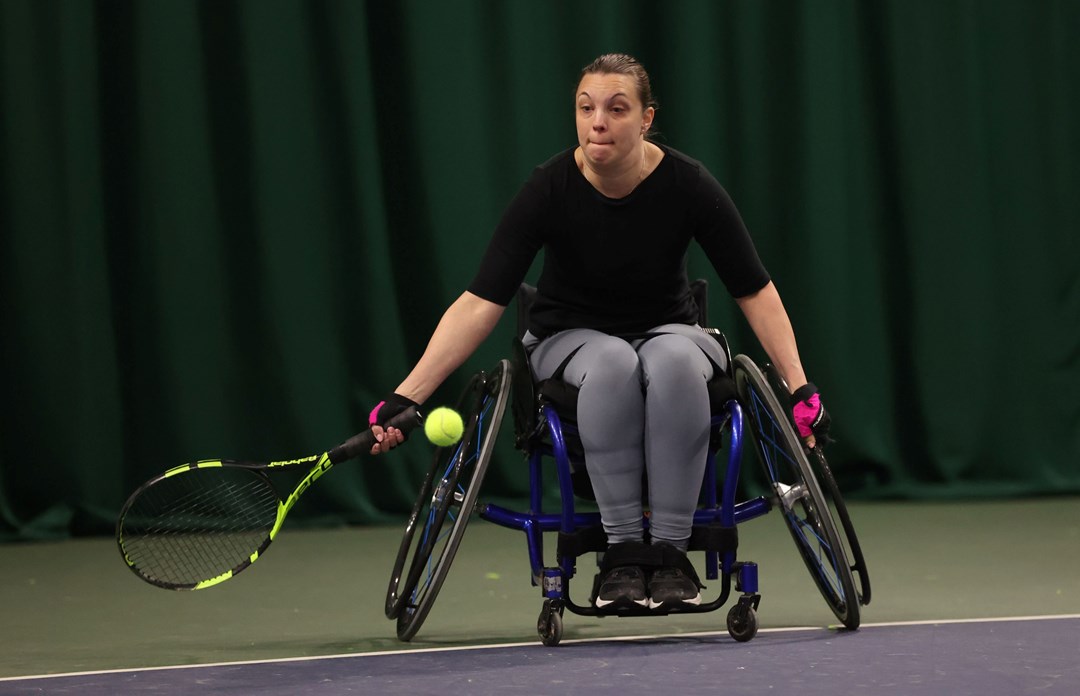 Wheelchair tennis player Naomie Traver reaching for a forehand t the Lexus Wheelchair National Finals