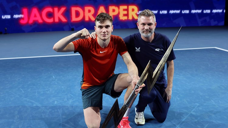 Jack Draper and James Trotman pose with teh Ultimate Tennis Showdown trophy