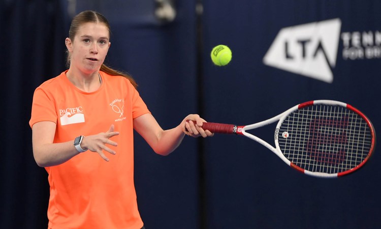 Para standing tennis player Georgia Routledge lines up a forehand