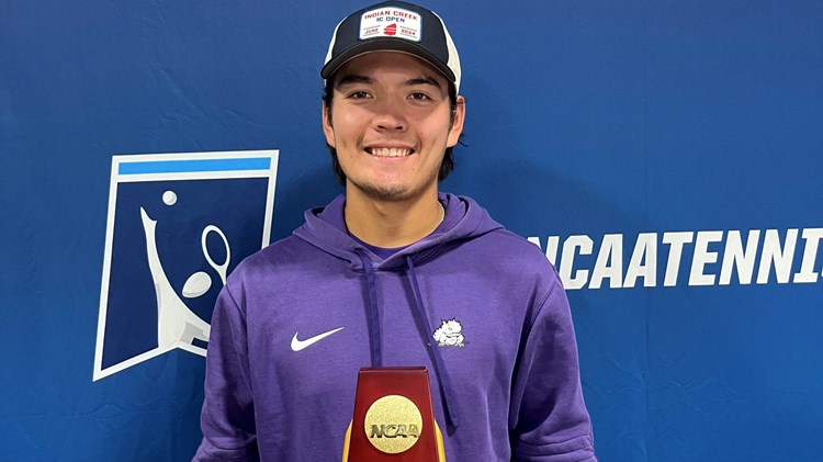 NCAA Doubles champion Lui Maxted with his trophy