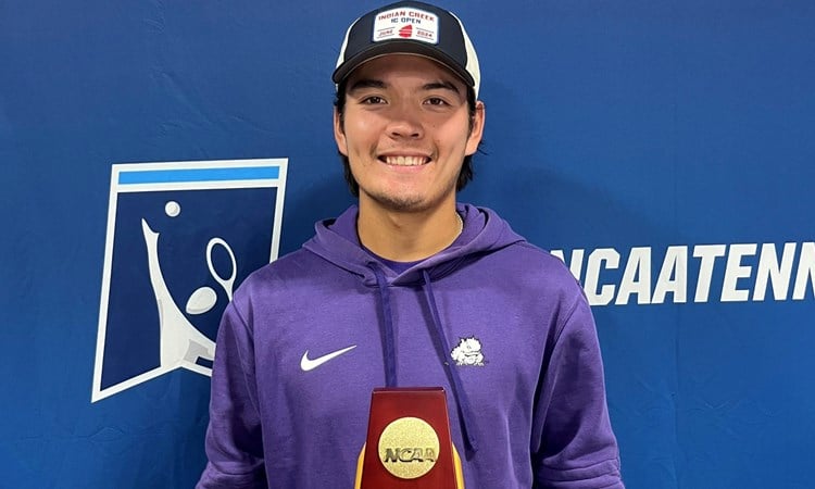 NCAA Doubles champion Lui Maxted with his trophy