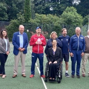 Mark Bullock receives Development Coach of the Year Award from MP Sarah  Olney at Sheen Common