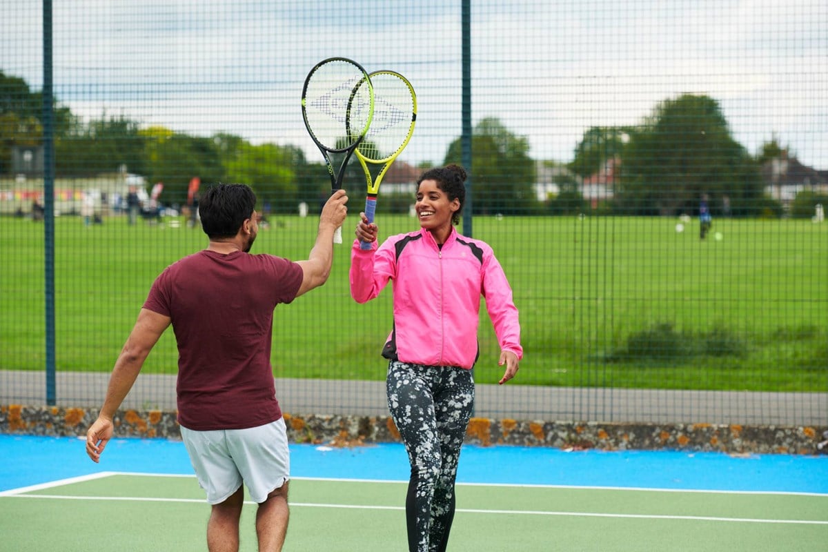 Players-high-five-on-park-court.jpg