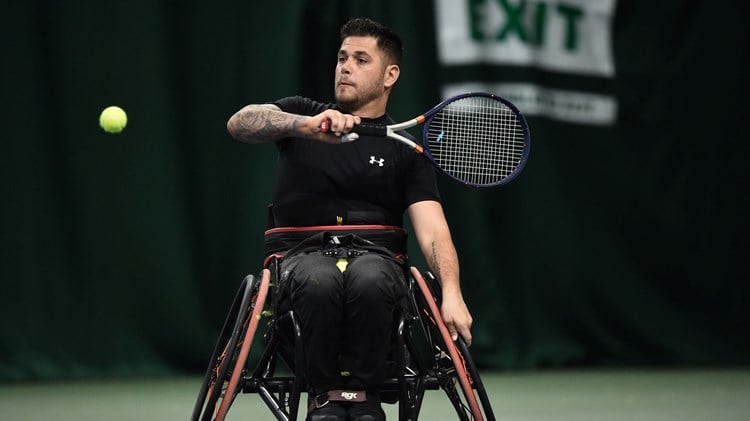 Gary Cox plays a shot to Tony Heslop in the mens singles match during the LTA Wheelchair National Finals at The Shrewsbury Club on November 27, 2021 in Shrewsbury, England.