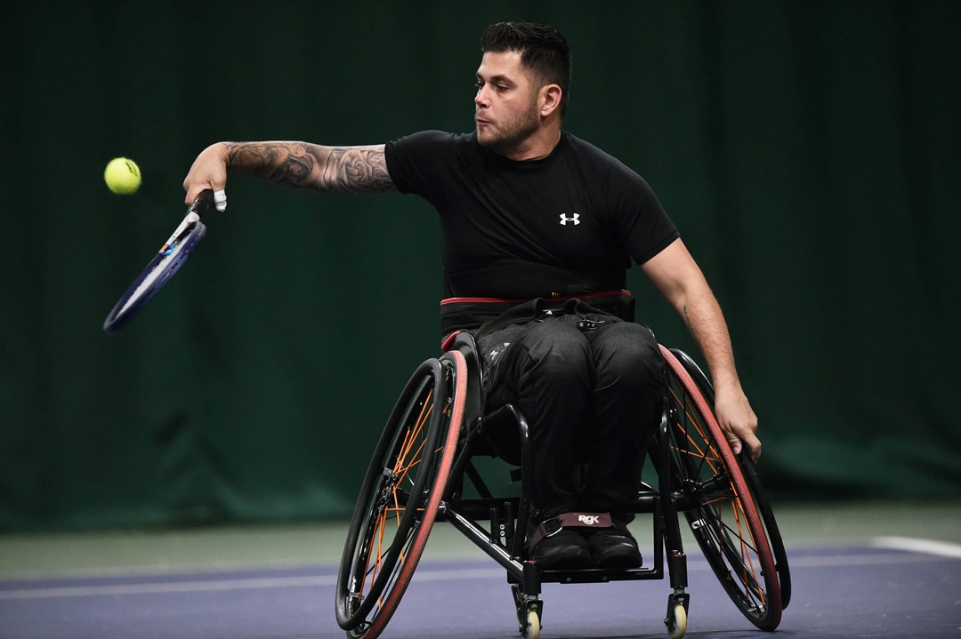 Gary Cox returning a backhand during the Quand singles final at the 2022 LTA Wheelchair Tennis National Finals