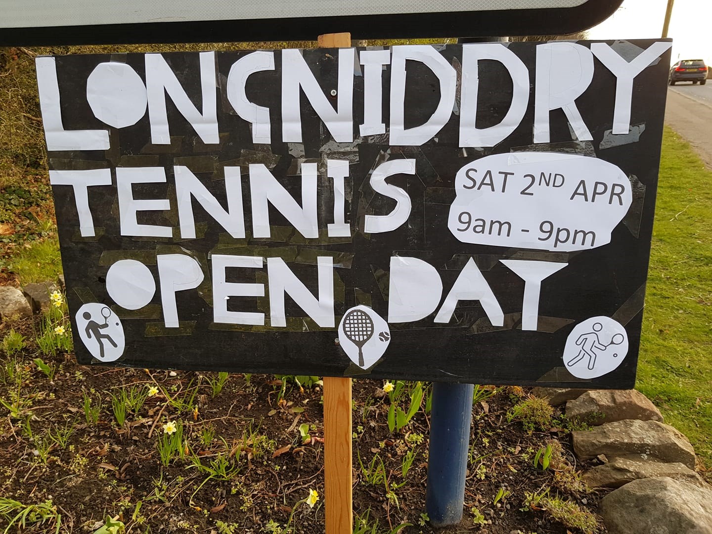 A sign created to promote Longniddry Tennis Club's Open Day