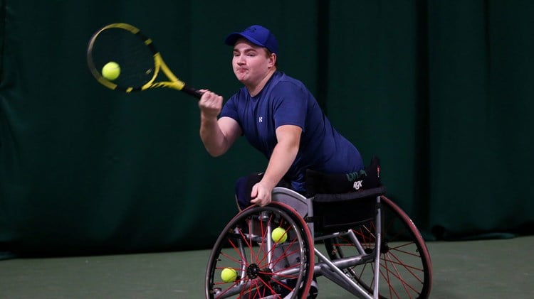 Andrew Penney returning a backhand during the men's wheelchair singles final at the 2022 LTA Wheelchair Tennis National Finals