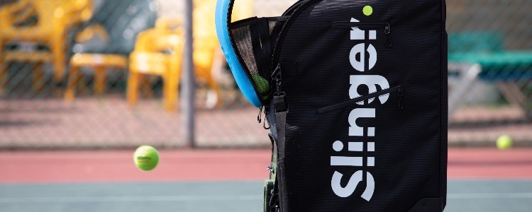 Close up of a Slinger bag on a tennis court