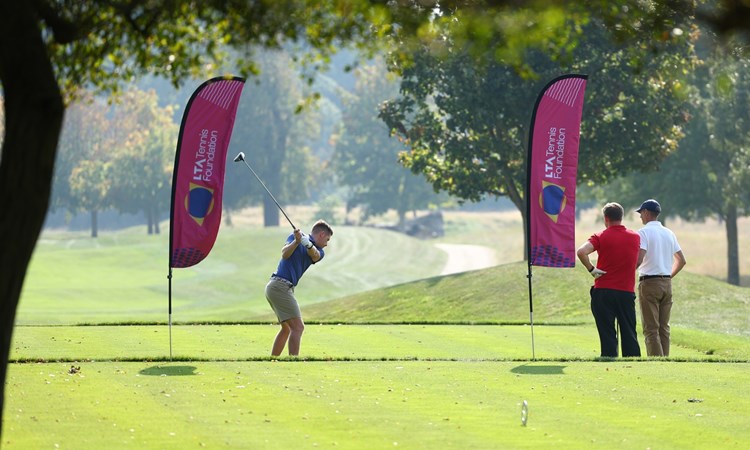 Neal Skupski teeing off at Hole 1 LTA Tennis Foundation Golf Day 