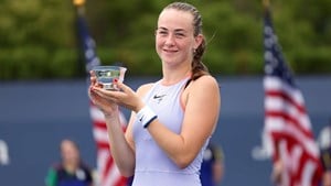 Mika Stojsavljevic holding the 2024 junior US Open girls' singles title