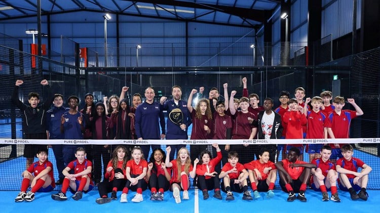 Jason Manford with a group of secondary school kids at an event at Pure Padel, Manchester