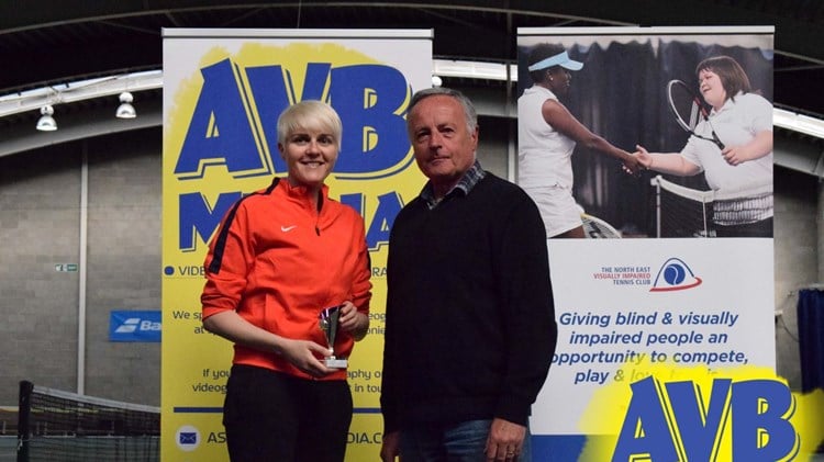Frankie Rohan photographed accepting her trophy after finishing runner-up in the B2 women's category at the 2018 Regional Visually Impaired Tournament