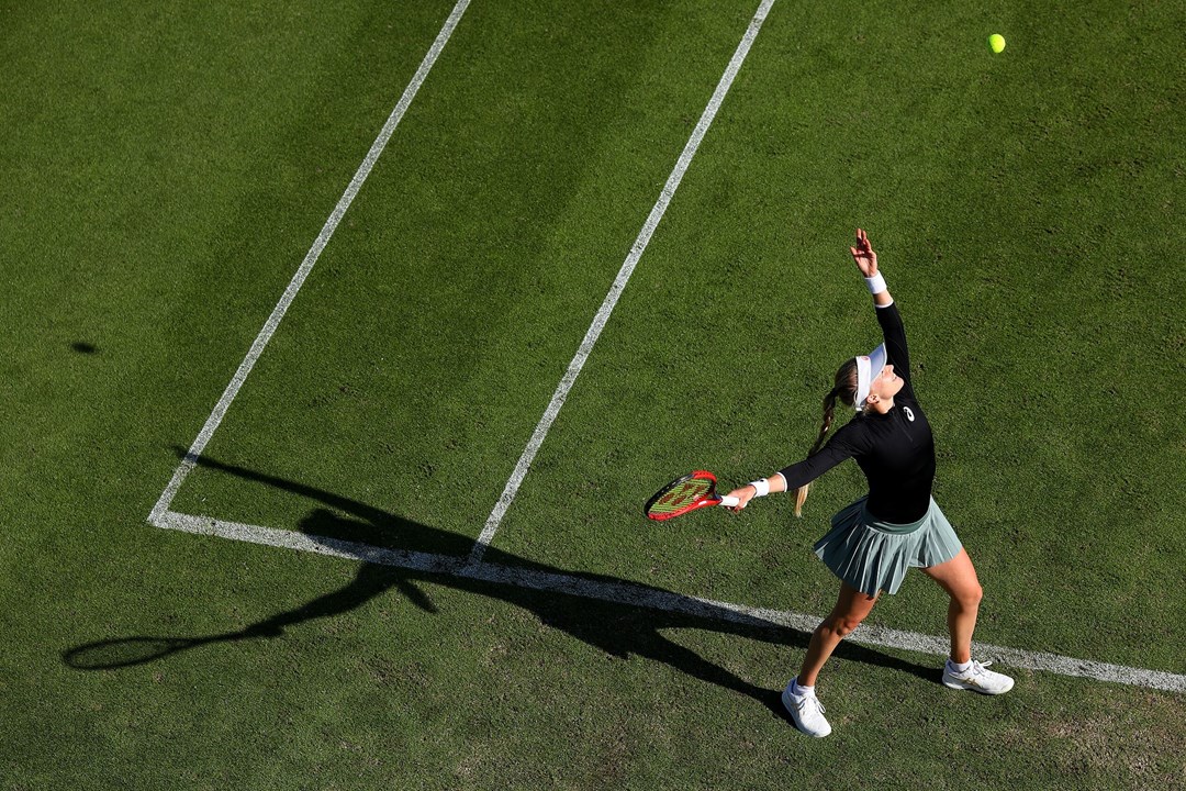 Harriet Dart of Great Britain serves during her first round women's doubles match with fellow Brit Heather Watson against Jelena Ostapenko of Latvia and Cori Gauff of USA 